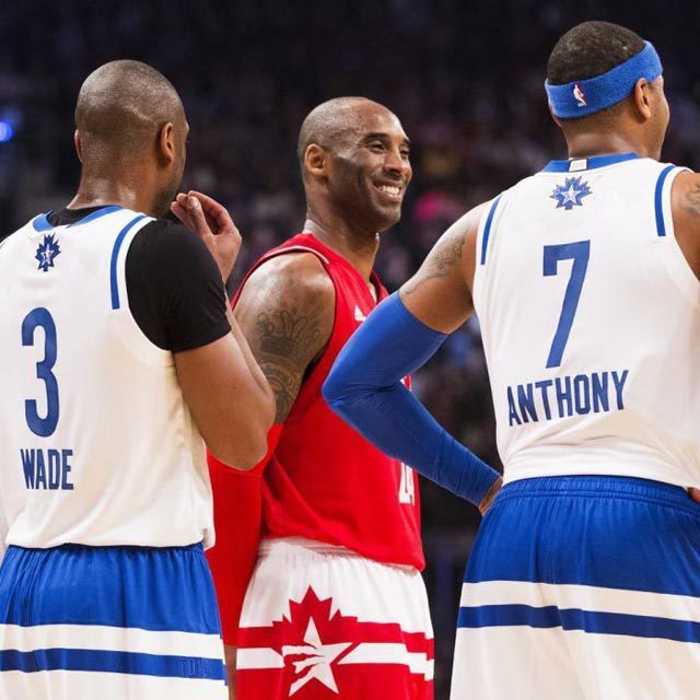 Western Conference's Kobe Bryant, of the Los Angeles Lakers (24) laughs with Eastern Conference's Dwyane Wade, of the Miami Heat (3) and New York Knicks' Carmelo Anthony (7) during the first half of the NBA all-star basketball game, Sunday, Feb. 14, 2016 in Toronto