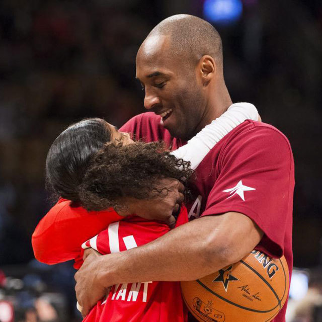 Los Angeles Lakers' Kobe Bryant (24) kisses his daughter before the first half of the NBA all-star basketball game, Sunday, Feb. 14, 2016 in Toronto